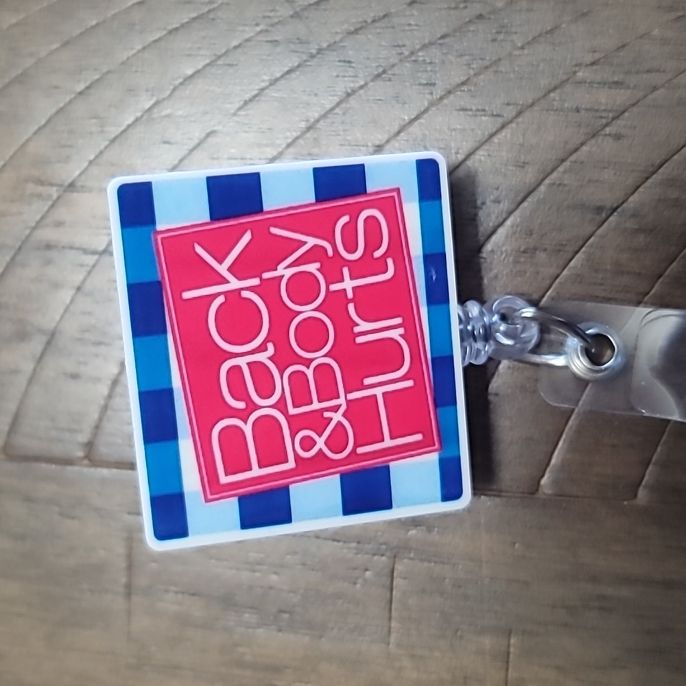 Back & Body Hurts badge reel
